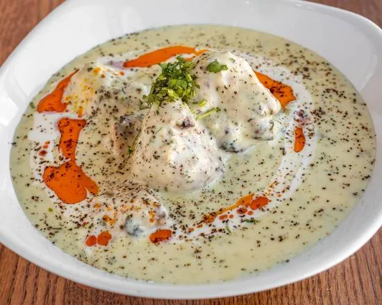 Chicken Shawarma Plate with rice, hummus, and vegetables at Original Shawarma Calgary