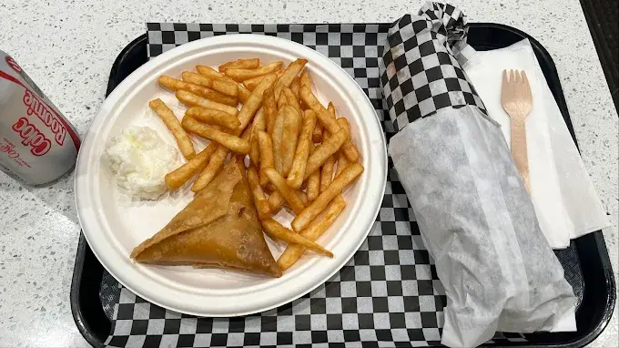 Beef donair with fresh salad and sauces at Original Shawarma Kensington Calgary